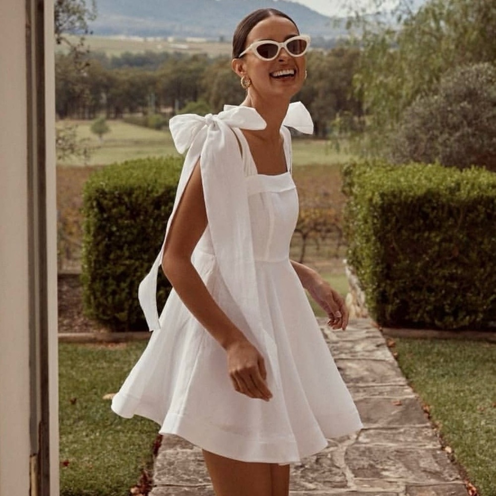 NEW DISSH Aisle White Linen Bow Mini Dress (Sz US 2) Shoulder Ties Circle Skirt